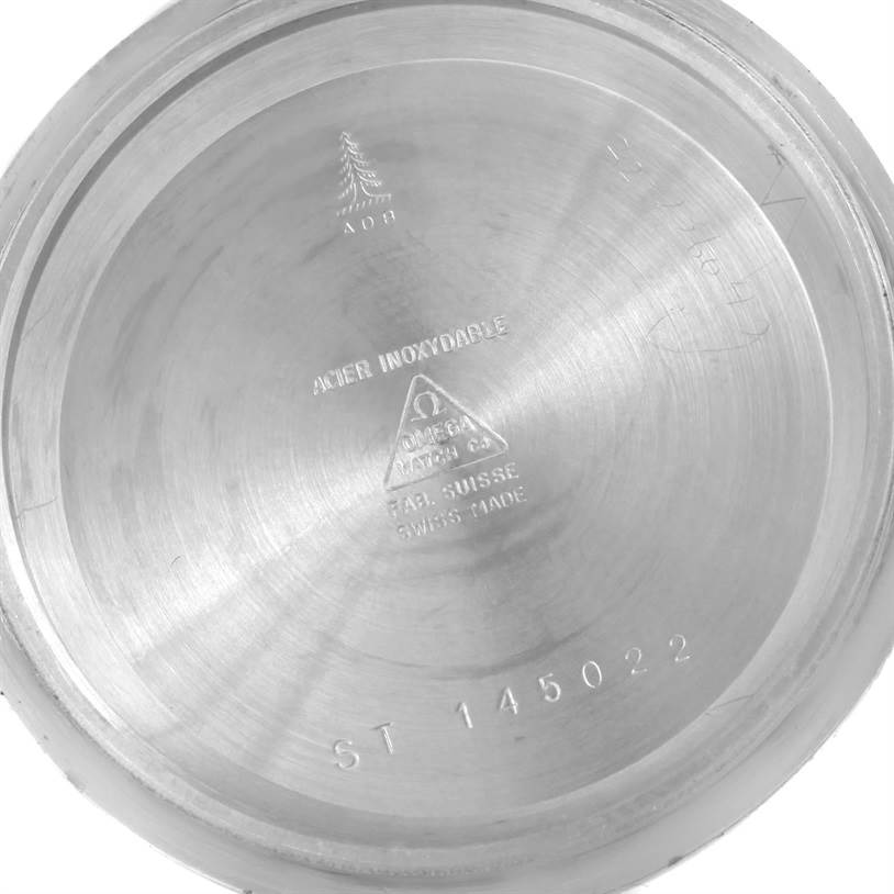 This image shows the interior of the case back of an Omega Speedmaster Men
s Stainless Steel Black Dial Men
s Stainless Steel Black Dial watch, featuring model number and markings.