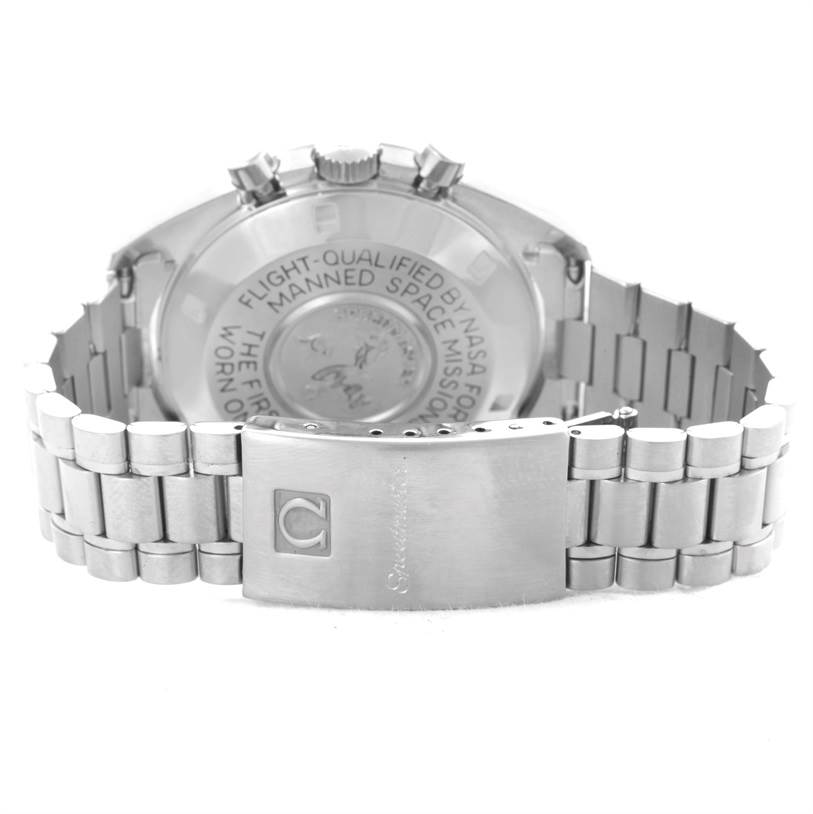 The image shows the back case and clasp bracelet of an Omega Speedmaster Men
s Stainless Steel Black Dial Men
s Stainless Steel Black Dial watch from a rear angle.