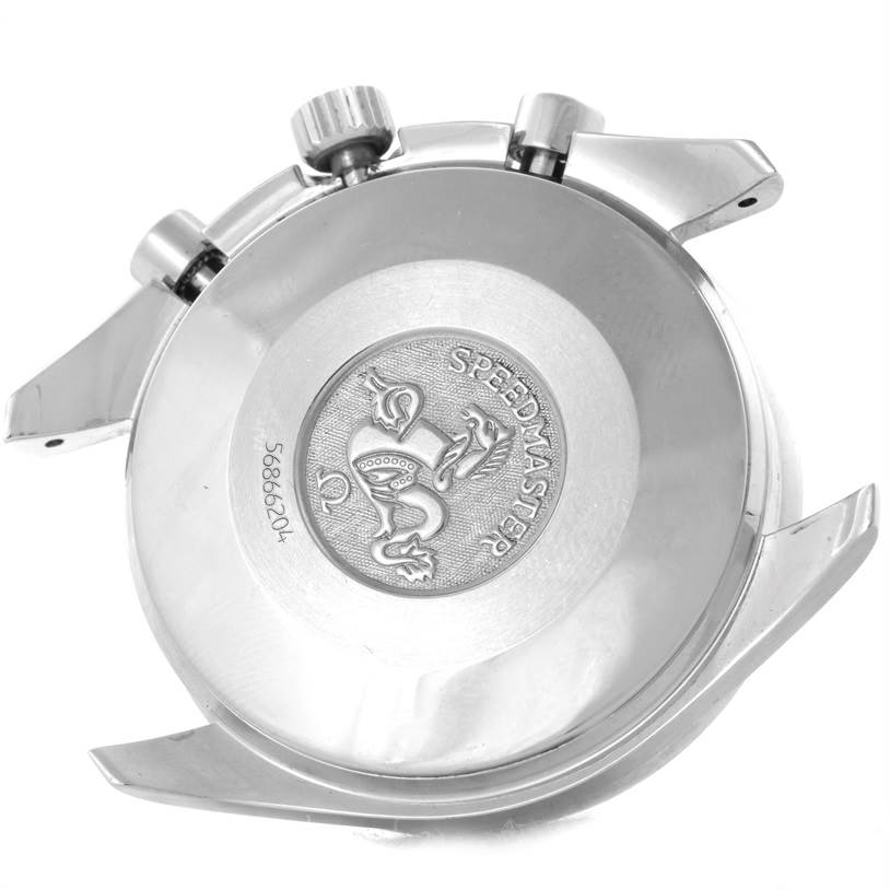 The image shows the backside of an Omega Speedmaster 3510.50.00 Men
s Stainless Steel Black Dial 3510.50.00 Men
s Stainless Steel Black Dial watch, highlighting its caseback engravings and chronograph pushers.