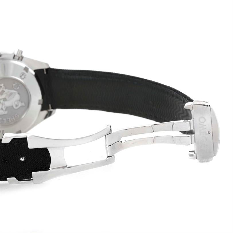 The image shows the clasp and part of the strap and the back case of an Omega Speedmaster 323.32.40.40.06.001 Men
s Stainless Steel Grey Dial 323.32.40.40.06.001 Men
s Stainless Steel Grey Dial watch at an angled side view.