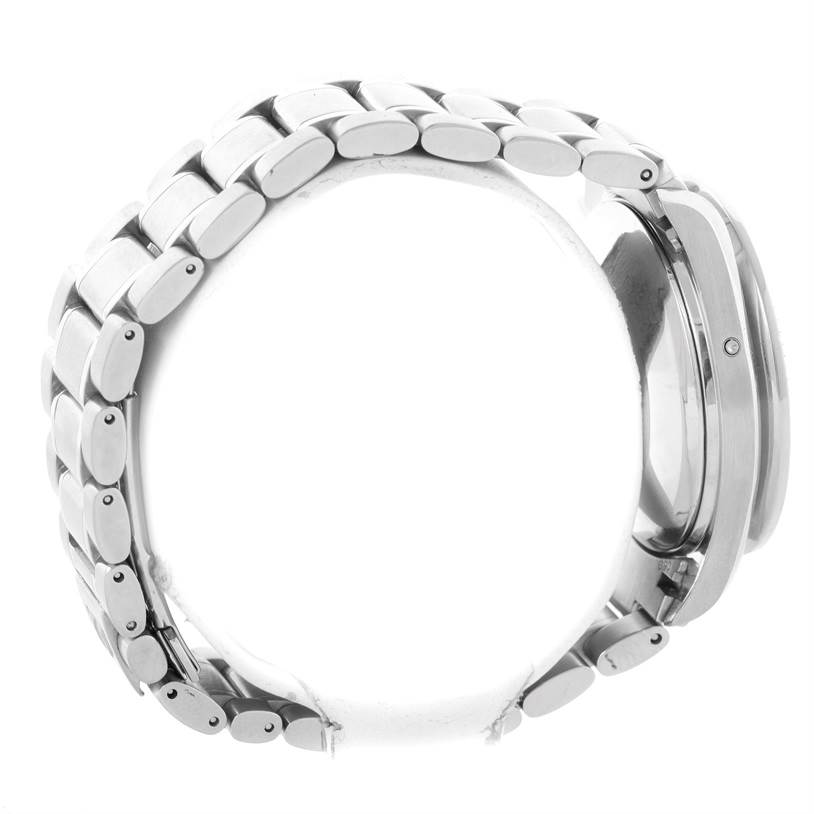 This image shows a side view of the Omega Speedmaster 3523.80.00 Men
s Stainless Steel Blue Dial 3523.80.00 Men
s Stainless Steel Blue Dial
s metal bracelet and case.