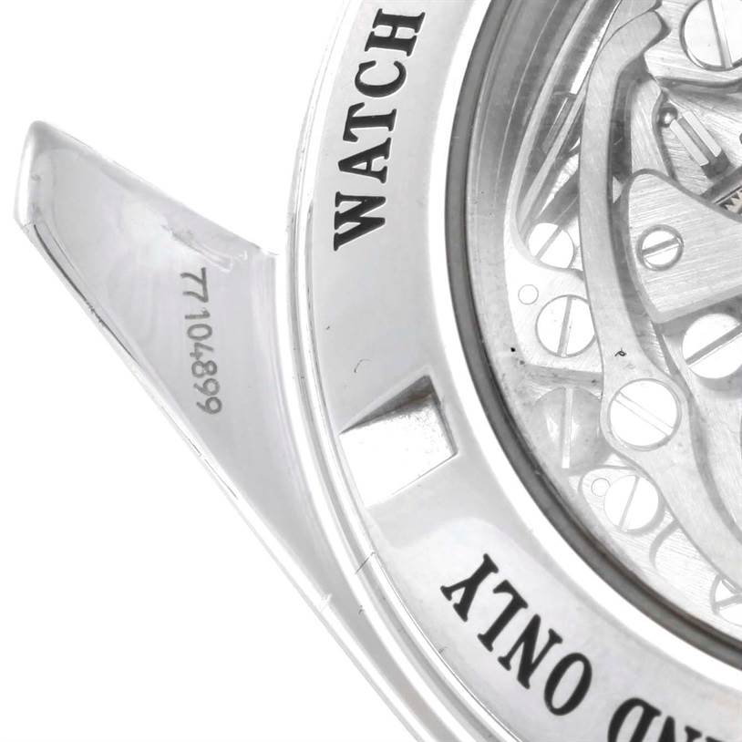 This image shows the back case and part of the skeleton movement of an Omega Speedmaster 3573.50.00 Men
s Stainless Steel Black Dial 3573.50.00 Men
s Stainless Steel Black Dial watch, viewed at an angle.