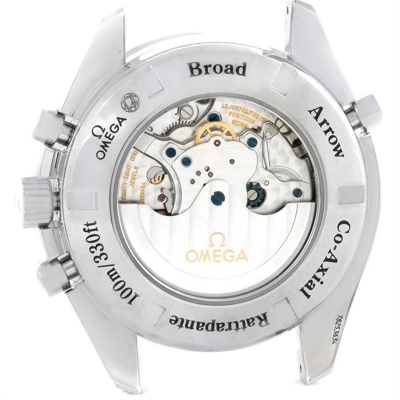 The image shows the back casing and internal mechanism of the Omega Speedmaster 3582.31.00 Men
s Stainless Steel White Dial 3582.31.00 Men
s Stainless Steel White Dial Broad Arrow watch, detailing the Co-Axial movement.