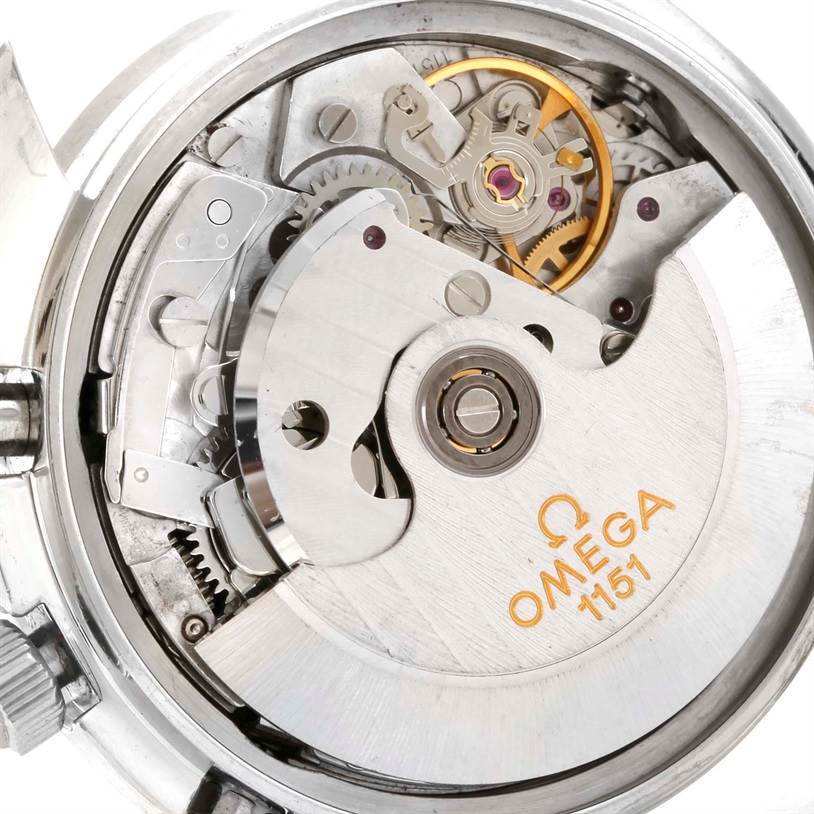 The image shows the internal mechanism of the Omega Speedmaster 3523.80.00 Men
s Stainless Steel Blue Dial 3523.80.00 Men
s Stainless Steel Blue Dial, focusing on the rotor and movement components labeled "1151".