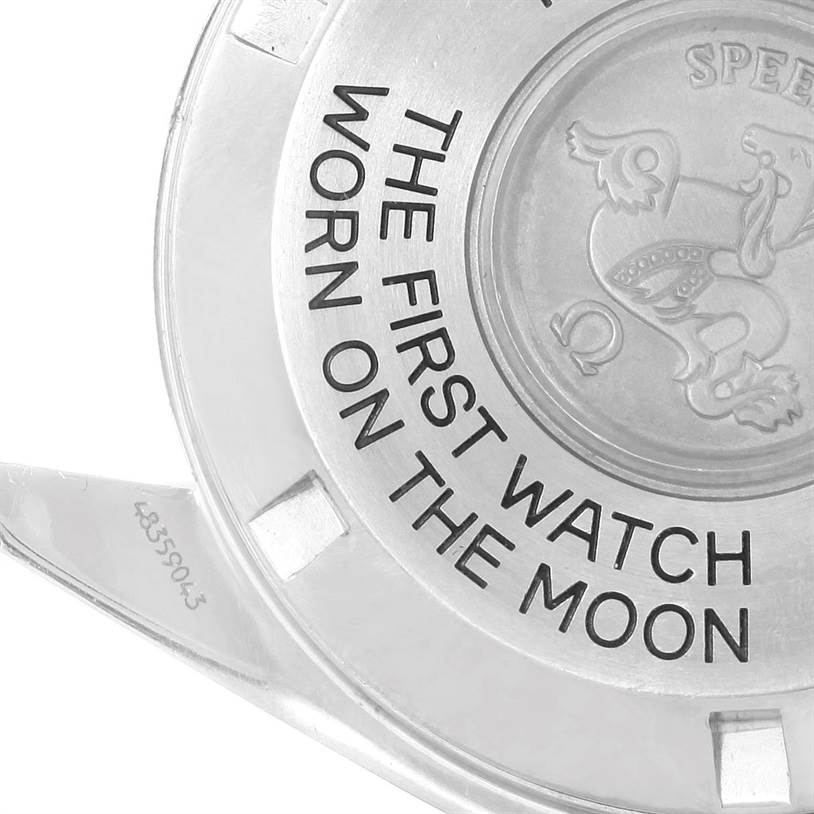 This image shows the back cover of an Omega Speedmaster Men
s Stainless Steel Black Dial Men
s Stainless Steel Black Dial watch, highlighting the inscription and logo.