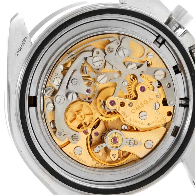 This image shows the intricate inner mechanism of an Omega Speedmaster Men
s Stainless Steel Black Dial Men
s Stainless Steel Black Dial watch from a rear angle with the back cover removed.