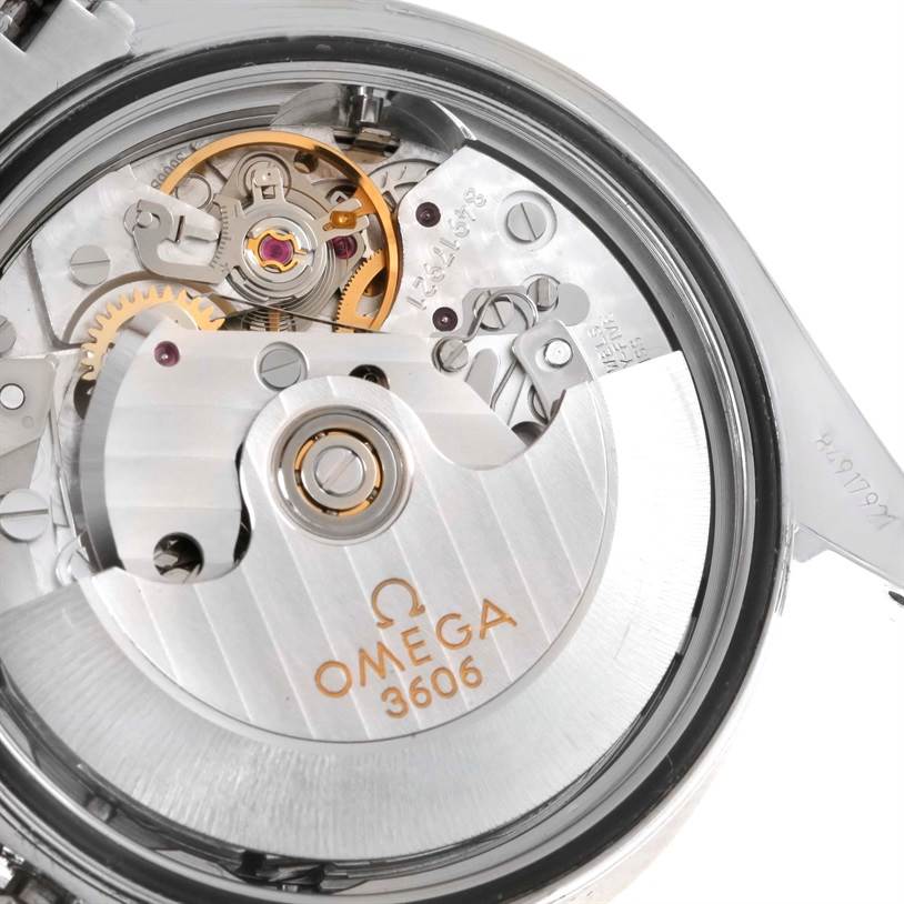 This image shows the close-up view of the Omega Speedmaster 3220.50.00 Men
s Stainless Steel Black Dial 3220.50.00 Men
s Stainless Steel Black Dial
s movement and internal mechanism.