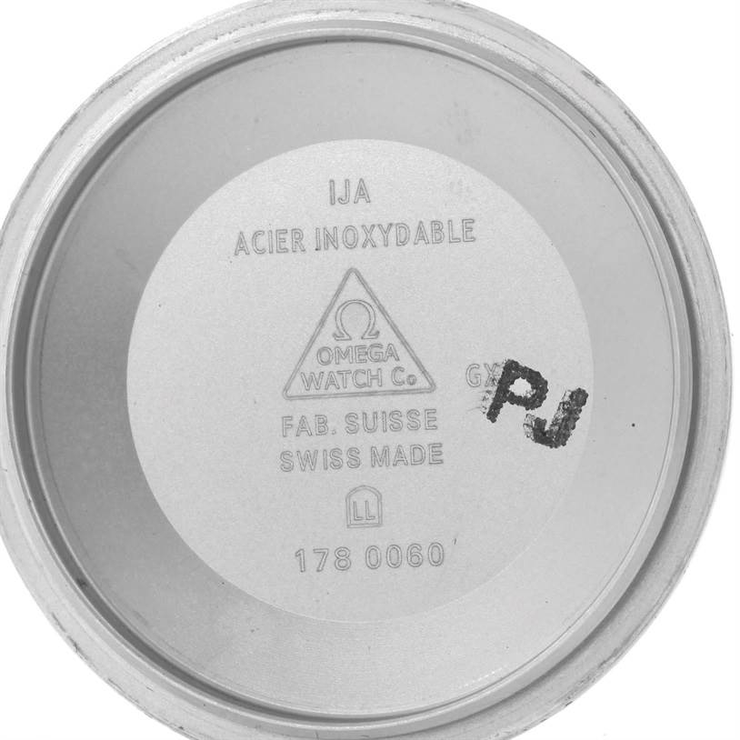 The image shows the inner case back of an Omega Speedmaster 3220.50.00 Men
s Stainless Steel Black Dial 3220.50.00 Men
s Stainless Steel Black Dial watch in a close-up view.