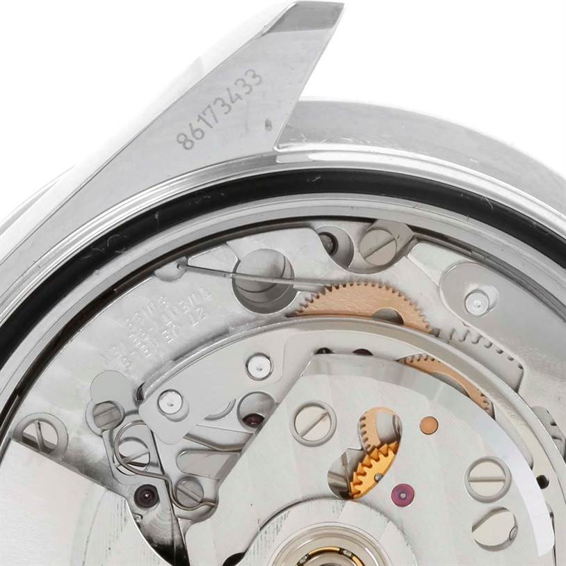 This image shows a close-up view of the intricate movement and inner mechanics of the Omega Speedmaster 323.30.40.40.06.001 Men
s Stainless Steel Black Dial 323.30.40.40.06.001 Men
s Stainless Steel Black Dial watch.