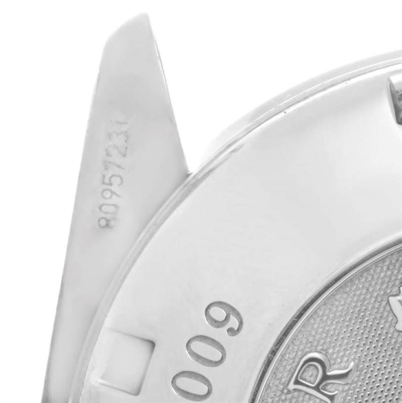 The image shows a close-up of the case back and lugs of an Omega Speedmaster 323.30.40.40.01.001 Men
s Stainless Steel Black Dial 323.30.40.40.01.001 Men
s Stainless Steel Black Dial watch.