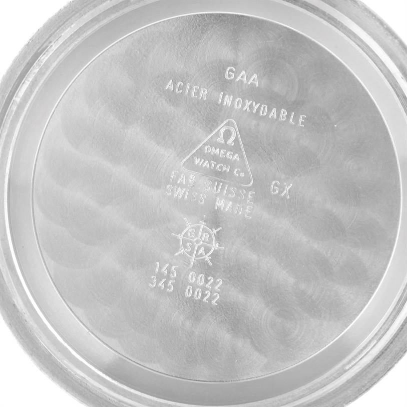 The image shows the interior of the case back of an Omega Speedmaster 3570.50.00 Men
s Stainless Steel Black Dial 3570.50.00 Men
s Stainless Steel Black Dial watch.