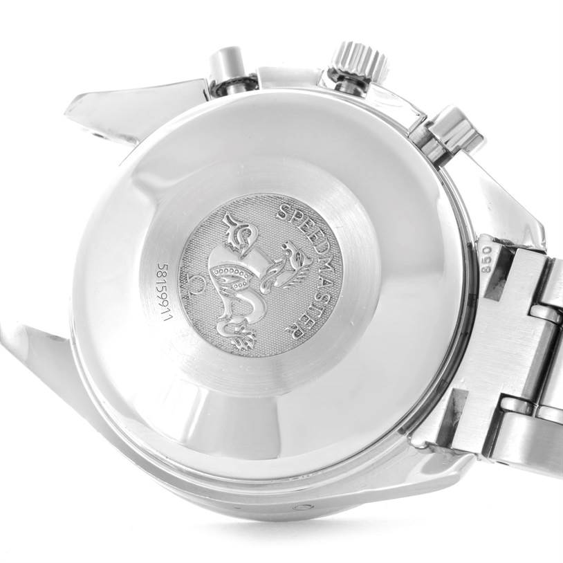 The image shows the back casing of an Omega Speedmaster 3523.30.00 Men
s Stainless Steel Silver Dial 3523.30.00 Men
s Stainless Steel Silver Dial watch, including the logo and strap attachment.