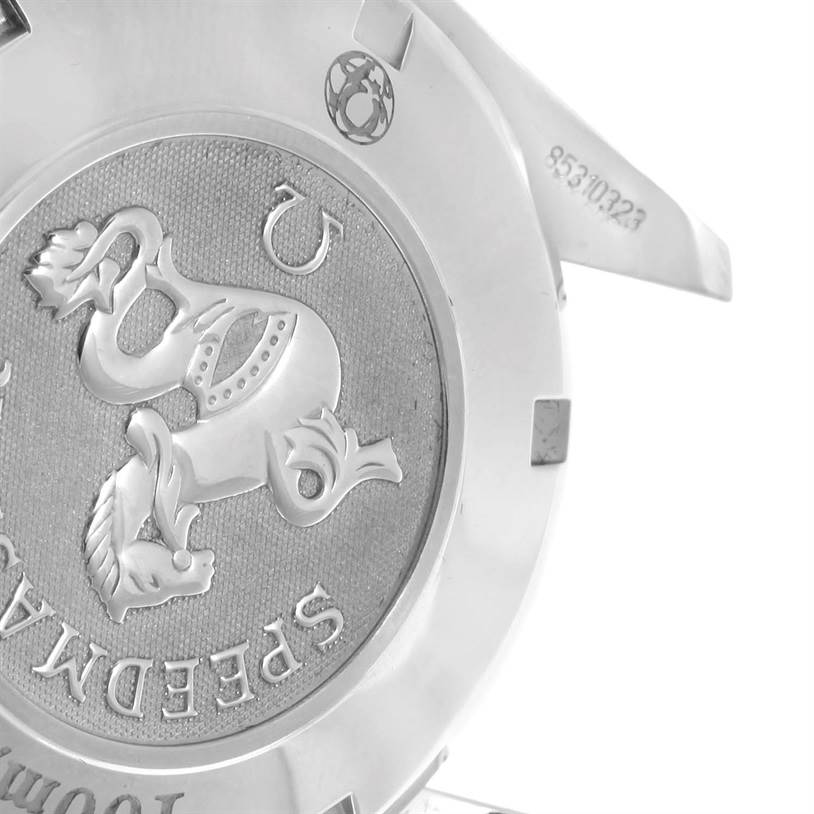 This image shows the back case of an Omega Speedmaster 323.30.40.40.04.001 Men
s Stainless Steel White Dial 323.30.40.40.04.001 Men
s Stainless Steel White Dial watch highlighting its engraved logo and serial number.