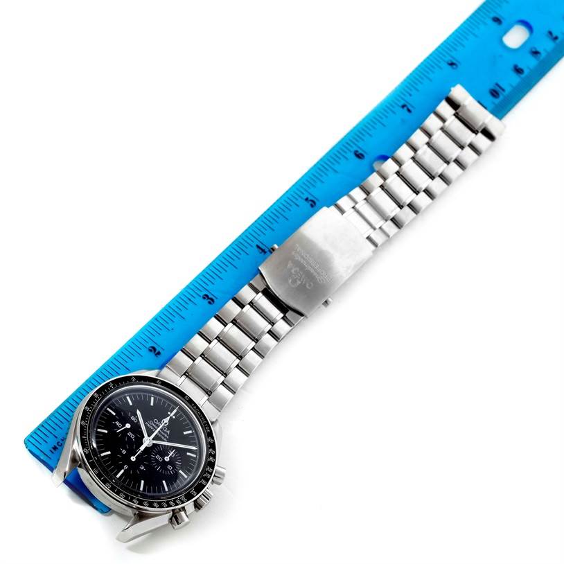 The Omega Speedmaster 3570.50.00 Men
s Stainless Steel Black Dial 3570.50.00 Men
s Stainless Steel Black Dial watch is shown from a top-down angle, displaying the face, bezel, bracelet, and clasp.