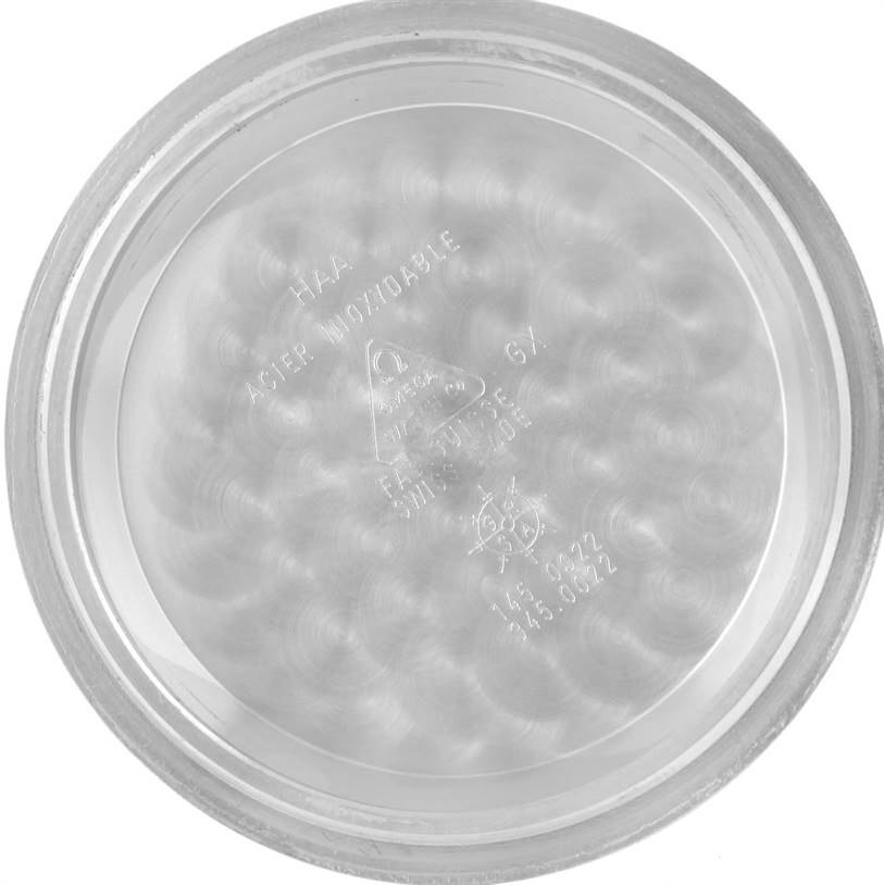 This image shows the inside case back of the Omega Speedmaster 3570.50.00 Men
s Stainless Steel Black Dial 3570.50.00 Men
s Stainless Steel Black Dial watch, displaying model and brand engravings.