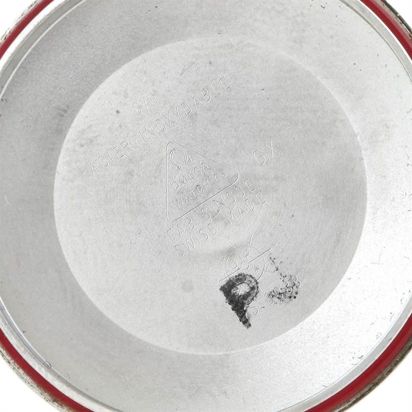 The image shows the inside of the watch back case of the Omega Speedmaster 3513.30.00 Men
s Stainless Steel Silver Dial 3513.30.00 Men
s Stainless Steel Silver Dial model, displaying engravings and markings.