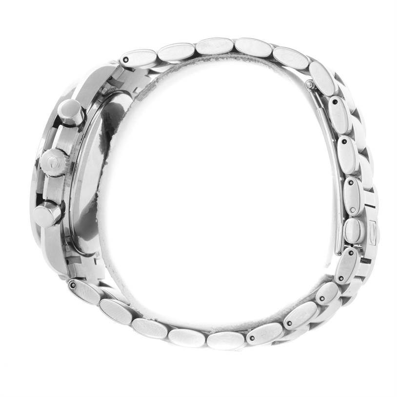 The Omega Speedmaster 3513.30.00 Men
s Stainless Steel Silver Dial 3513.30.00 Men
s Stainless Steel Silver Dial watch is displayed from a side view, highlighting the bezel, crown, pushers, and metal strap.