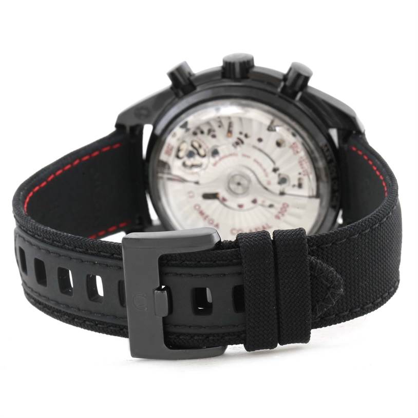 The image shows the back view of an Omega Speedmaster 311.92.44.51.01.003 Men
s Stainless Steel Black Dial 311.92.44.51.01.003 Men
s Stainless Steel Black Dial watch, featuring its black strap and visible movement mechanism.