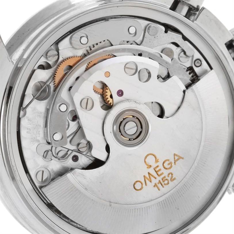 This is a close-up of the internal mechanism of an Omega Speedmaster 3513.50.00 Stainless Steel Black Dial 3513.50.00 Stainless Steel Black Dial watch, showing gears and the Omega 1152 caliber.