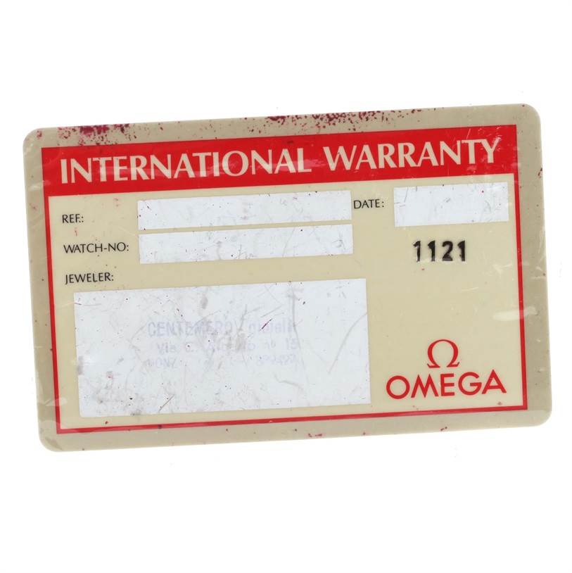 This image shows the international warranty card for the Omega Speedmaster 3510.61.00 Men's Stainless Steel Red Dial 3510.61.00 Men's Stainless Steel Red Dial model watch. 