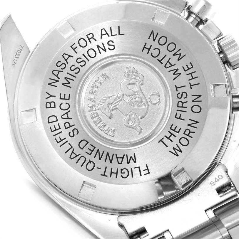 This image shows the back case of an Omega Speedmaster 3570.50.00 Men
s Stainless Steel Black Dial 3570.50.00 Men
s Stainless Steel Black Dial watch, displaying engravings and part of the metal strap.