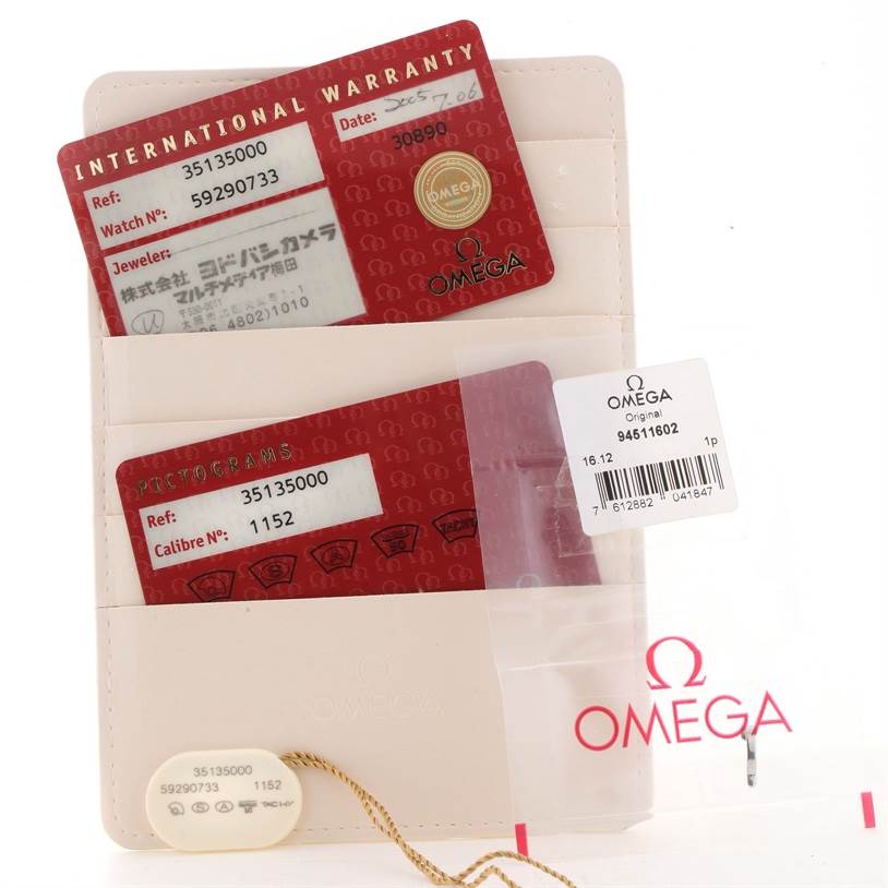 The image shows Omega Speedmaster 3513.50.00 Men
s Stainless Steel Black Dial 3513.50.00 Men
s Stainless Steel Black Dial warranty cards, pictogram cards, a tag, and packaging.