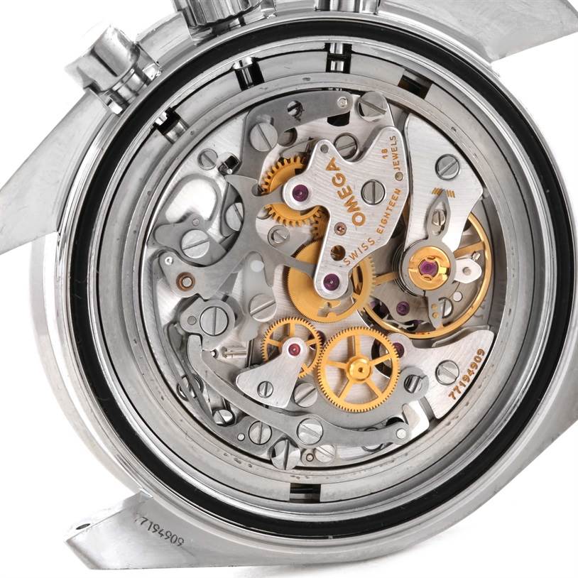 The image shows the back view of the Omega Speedmaster 311.30.42.30.01.001 Men's Stainless Steel Black Dial 311.30.42.30.01.001 Men's Stainless Steel Black Dial watch, revealing its intricate movement and mechanical parts.