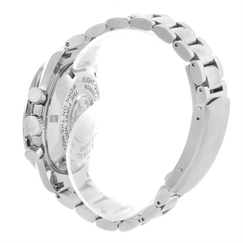 The image shows the clasp and back case of an Omega Speedmaster 3570.50.00 Men
s Stainless Steel Black Dial 3570.50.00 Men
s Stainless Steel Black Dial watch from a side angle.