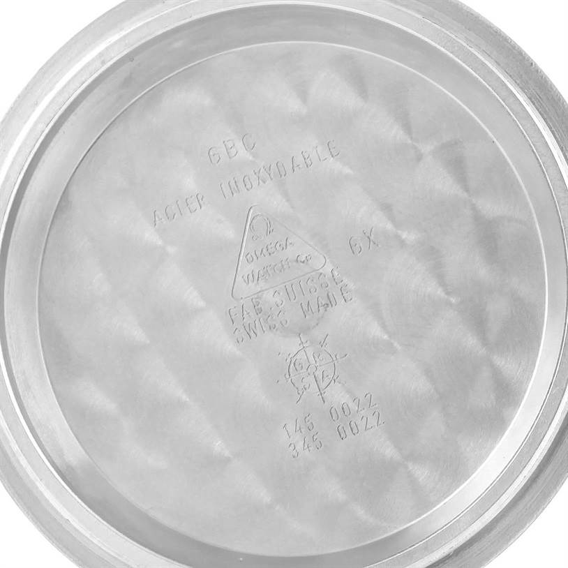 This is an image of the inner case back for the Omega Speedmaster 3570.50.00 Men
s Stainless Steel Black Dial 3570.50.00 Men
s Stainless Steel Black Dial watch model, showing inscriptions and markings.