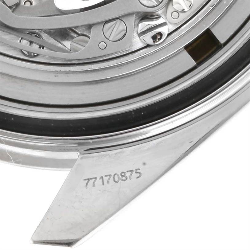 This close-up image shows the case back and part of the movement of an Omega Speedmaster 3570.50.00 Men
s Stainless Steel Black Dial 3570.50.00 Men
s Stainless Steel Black Dial watch.