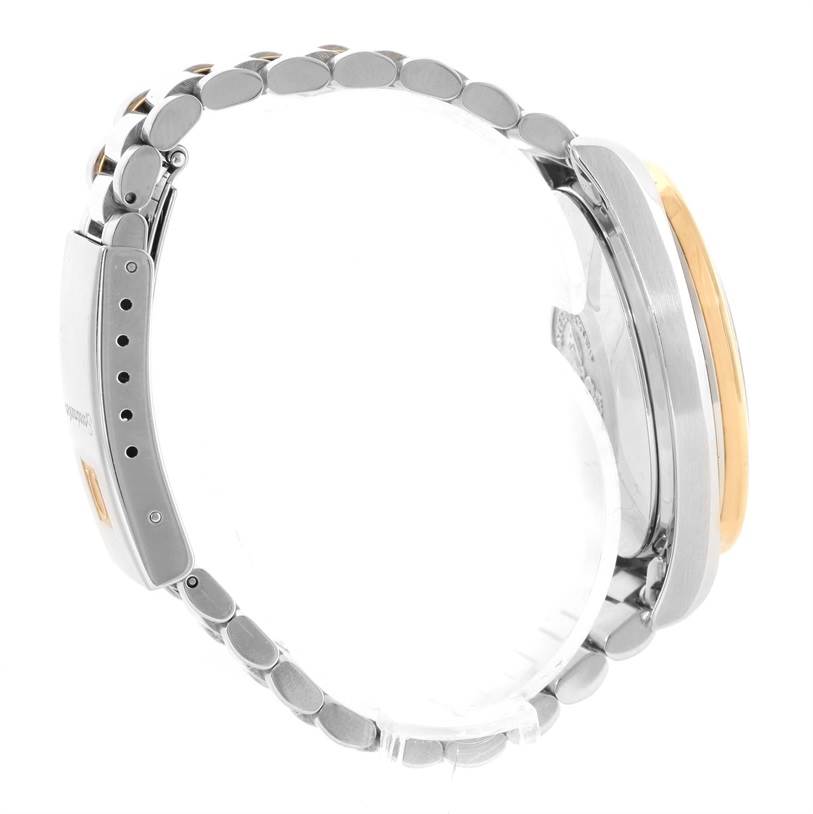 The image shows a side view of an Omega Speedmaster 3310.10 Men's Steel and Gold (two tone) Champagne Dial 3310.10 Men's Steel and Gold (two tone) Champagne Dial watch, highlighting its band and clasp.