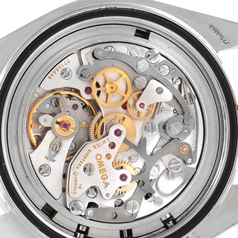 The image shows the inner mechanical parts of the Omega Speedmaster 3570.50.00 Men
s Stainless Steel Black Dial 3570.50.00 Men
s Stainless Steel Black Dial watch from the rear angle, highlighting gears and mechanisms.