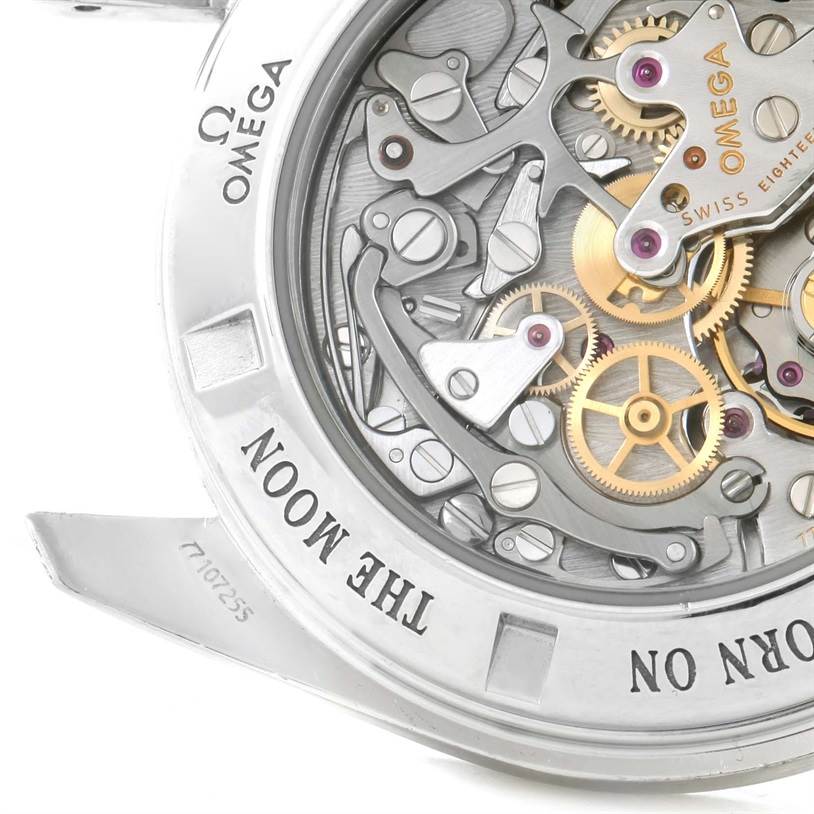 This image shows the back view of the Omega Speedmaster 3573.50.00 Men
s Stainless Steel Black Dial 3573.50.00 Men
s Stainless Steel Black Dial, revealing its intricate movement and internal mechanisms.