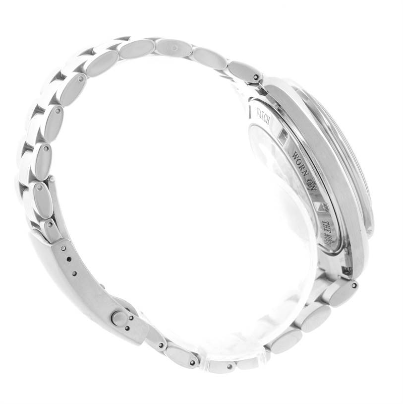 The image shows a side profile view of an Omega Speedmaster 3573.50.00 Men
s Stainless Steel Black Dial 3573.50.00 Men
s Stainless Steel Black Dial
s watch case and metal bracelet.