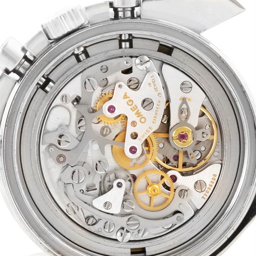 This image shows the intricate inner mechanics of an Omega Speedmaster 3571.50.00 Men
s Stainless Steel Black Dial 3571.50.00 Men
s Stainless Steel Black Dial watch from a rear angle.