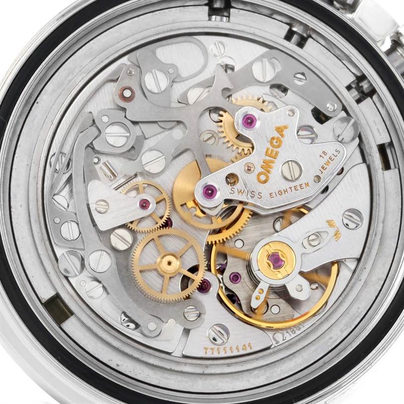 This image shows the intricate inner mechanism of an Omega Speedmaster 3570.50.00 Men
s Stainless Steel Black Dial 3570.50.00 Men
s Stainless Steel Black Dial watch, highlighting its gears and jewels.