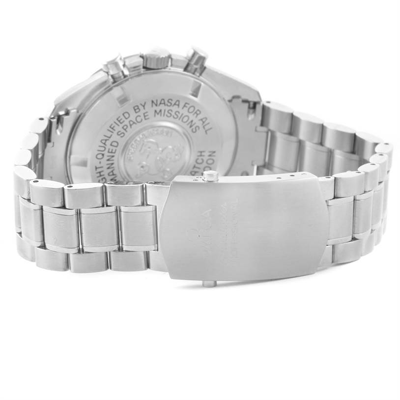 The image shows the back and clasp of an Omega Speedmaster 3570.50.00 Men
s Stainless Steel Black Dial 3570.50.00 Men
s Stainless Steel Black Dial watch, highlighting its metal bracelet and engraved case back.