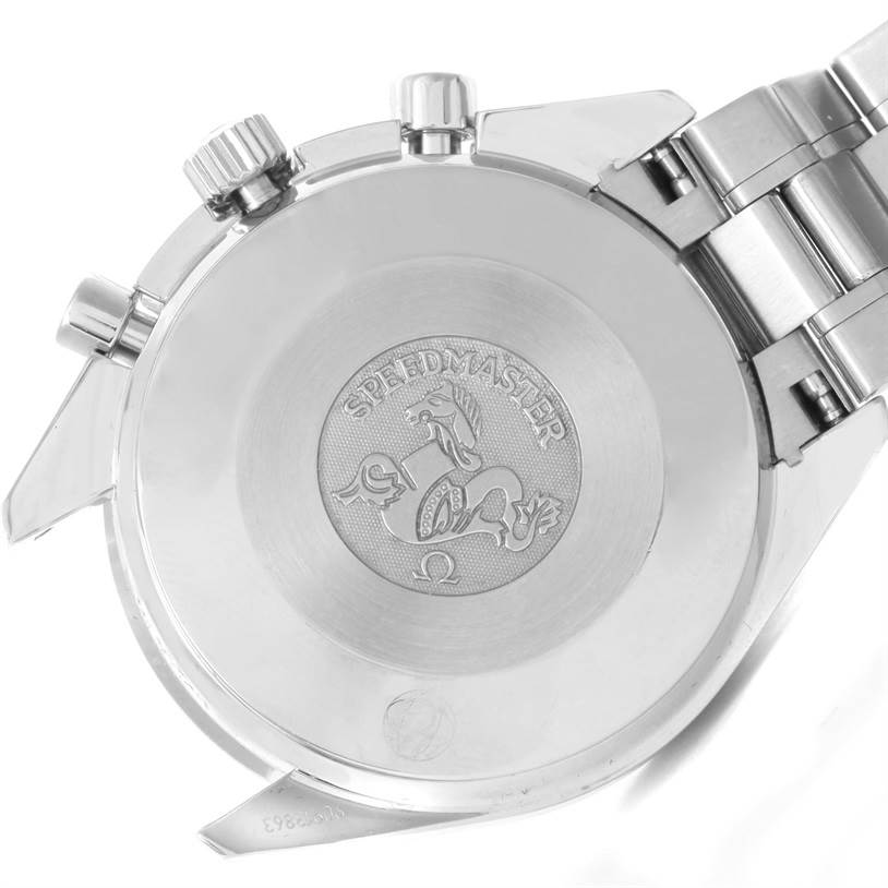 The image shows the back case of the Omega Speedmaster 3539.50.00 Men
s Stainless Steel Black Dial 3539.50.00 Men
s Stainless Steel Black Dial watch, including its engraved logo and stainless steel bracelet.