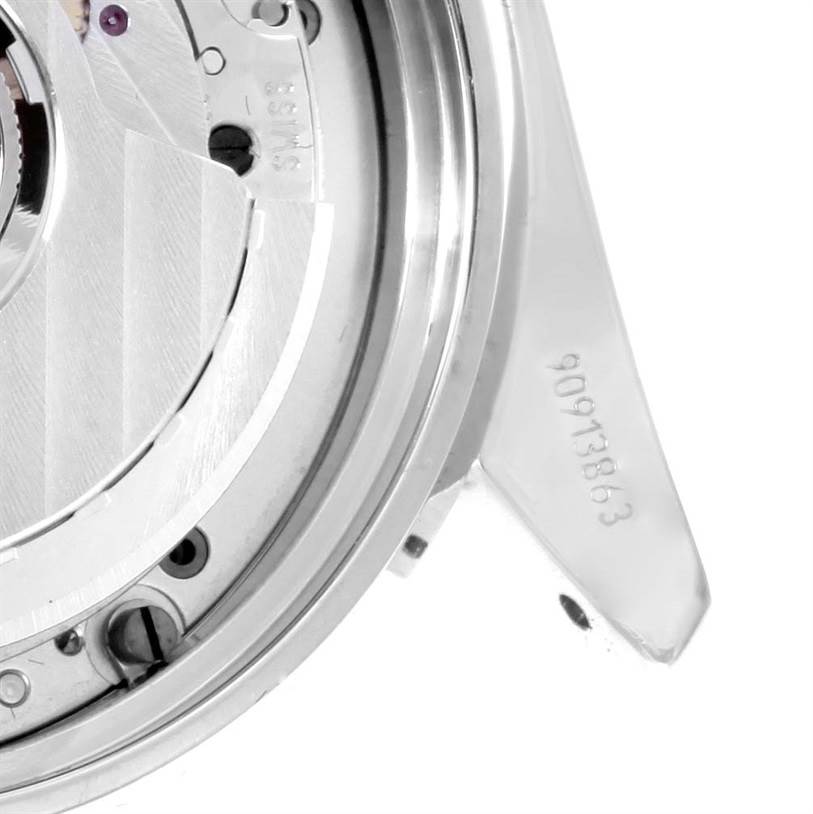 The image shows a partial view of the Omega Speedmaster 3539.50.00 Men
s Stainless Steel Black Dial 3539.50.00 Men
s Stainless Steel Black Dial
s movement and caseback from a front angle.