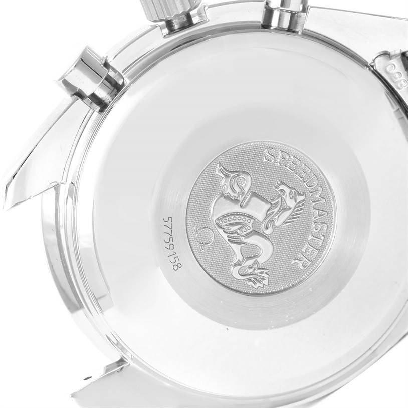 The image shows the back case and pushers of an Omega Speedmaster 3513.30.00 Men's Stainless Steel Silver Dial 3513.30.00 Men's Stainless Steel Silver Dial watch, featuring the engraved Speedmaster logo.