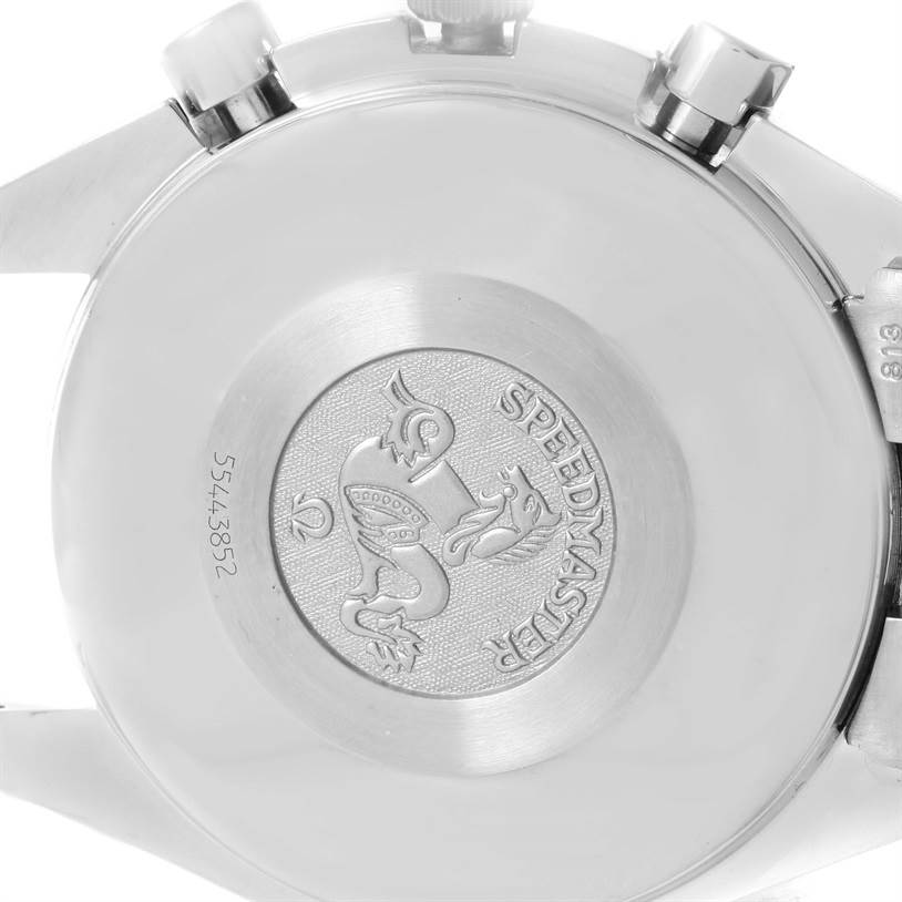 This image shows the back case of an Omega Speedmaster 3521.80.00 Men
s Stainless Steel Blue Dial 3521.80.00 Men
s Stainless Steel Blue Dial watch, highlighting the logo and serial number.