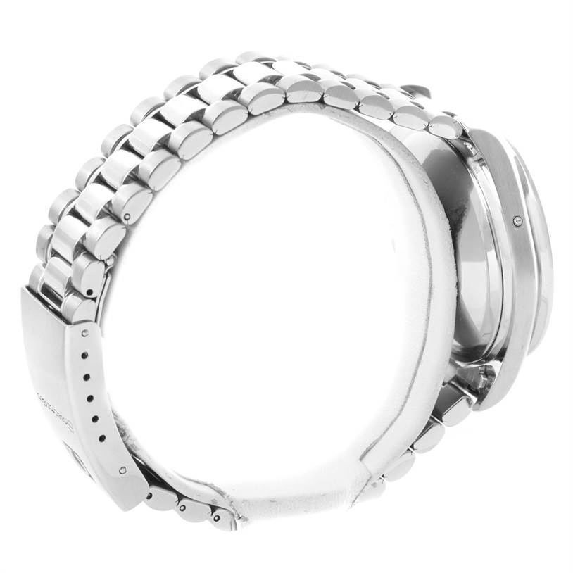 This image shows a side view of the Omega Speedmaster 3521.80.00 Men
s Stainless Steel Blue Dial 3521.80.00 Men
s Stainless Steel Blue Dial watch highlighting its metal bracelet and case.