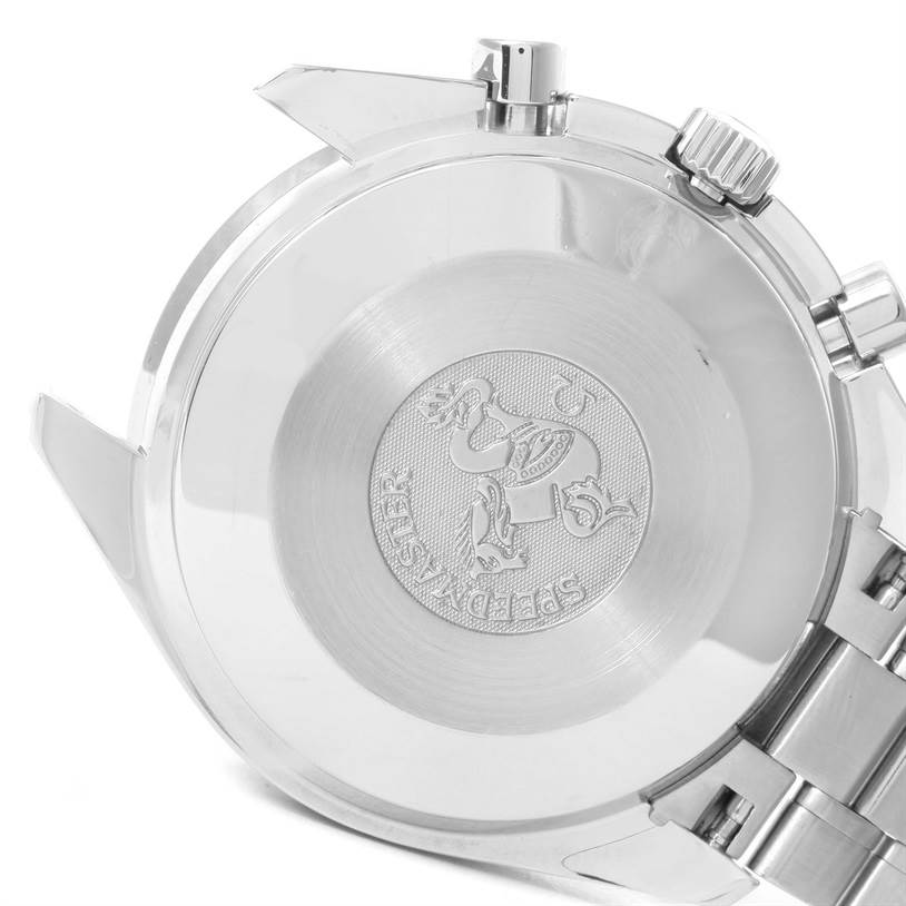 The image shows the case back of an Omega Speedmaster 3539.50.00 Men
s Stainless Steel Black Dial 3539.50.00 Men
s Stainless Steel Black Dial watch, highlighting its engraved logo and part of the bracelet.