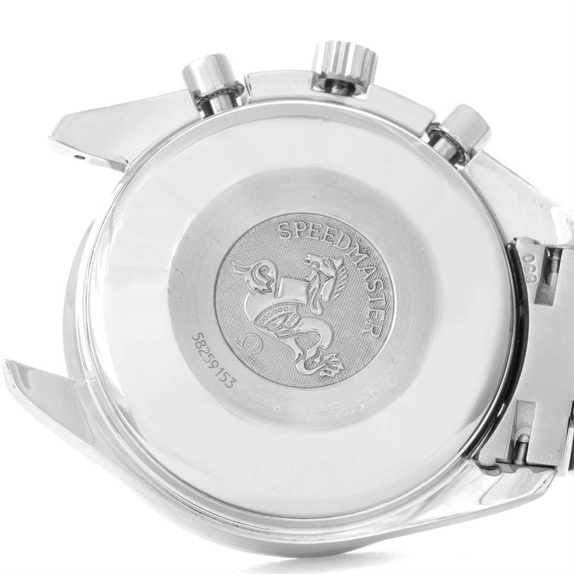 The image shows the back case and some side buttons of an Omega Speedmaster 3513.50.00 Men
s Stainless Steel Black Dial 3513.50.00 Men
s Stainless Steel Black Dial watch.