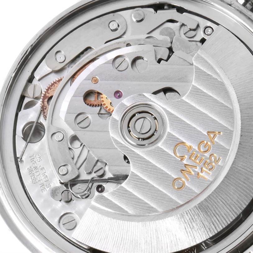 The image shows the internal mechanical movement of an Omega Speedmaster 3513.50.00 Men
s Stainless Steel Black Dial 3513.50.00 Men
s Stainless Steel Black Dial watch, highlighting the intricate gears and rotor.