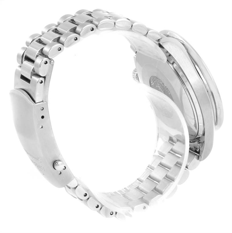 The image shows a side view of the Omega Speedmaster 3539.50.00 Men
s Stainless Steel Black Dial 3539.50.00 Men
s Stainless Steel Black Dial watch, focusing on the metal bracelet and clasp.