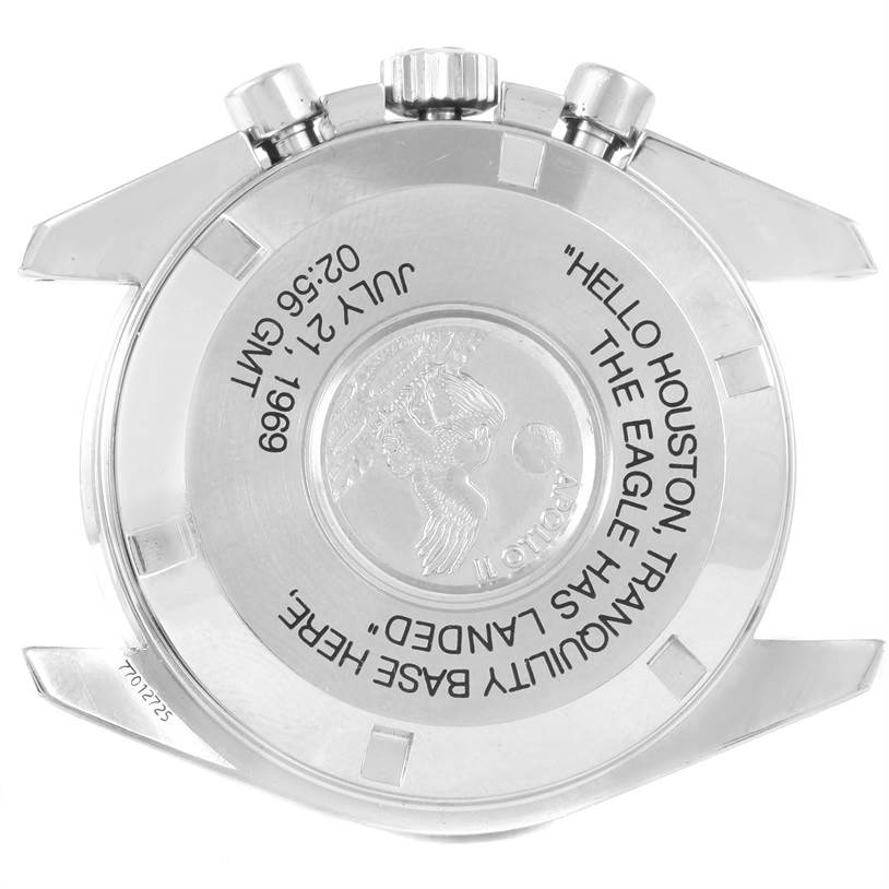 The image shows the case back of an Omega Speedmaster 3560.50.00 Men
s Stainless Steel Black Dial 3560.50.00 Men
s Stainless Steel Black Dial watch, featuring an engraved emblem and commemorative text.