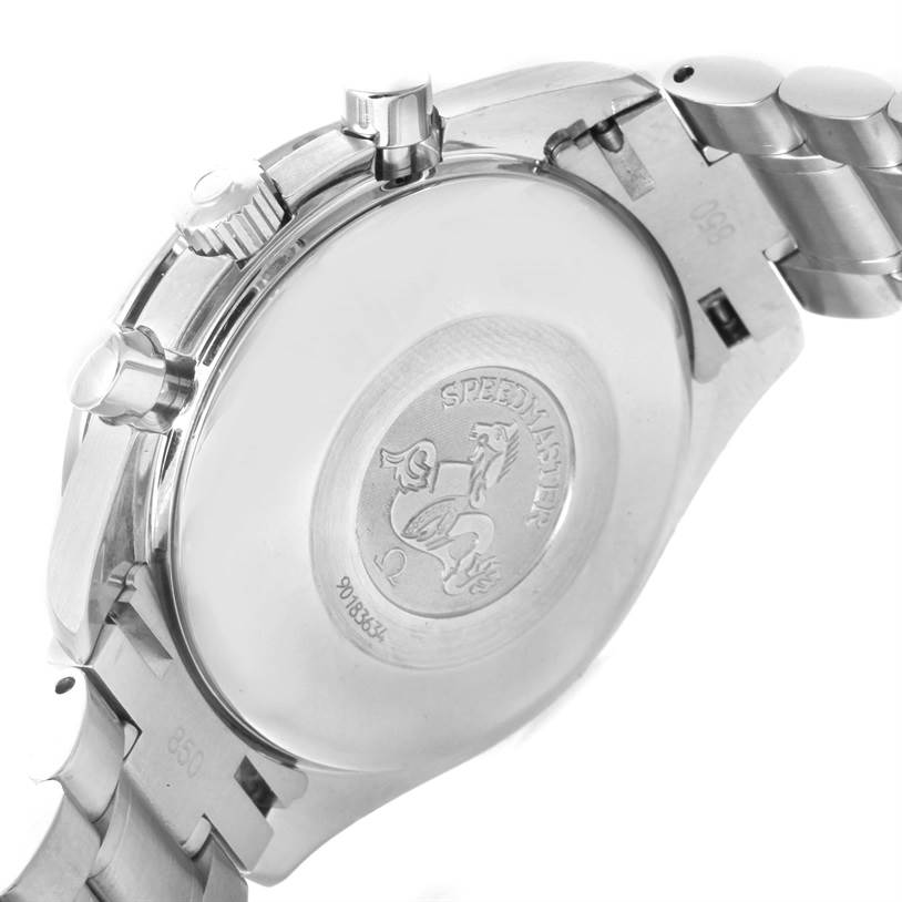 The image shows the back case and part of the bracelet of a Speedmaster model by Omega.