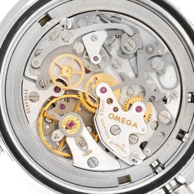 The image shows the intricate internal mechanism of the Omega Speedmaster 3570.50.00 Men
s Stainless Steel Black Dial 3570.50.00 Men
s Stainless Steel Black Dial watch from a rear angle.