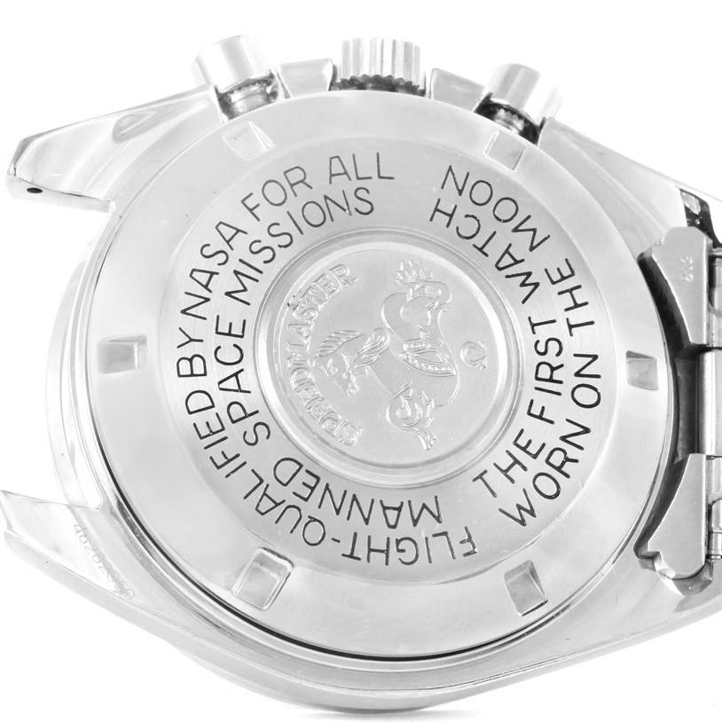 The image shows the back of an Omega Speedmaster Men
s Stainless Steel Black Dial Men
s Stainless Steel Black Dial watch, highlighting its engravings and details.